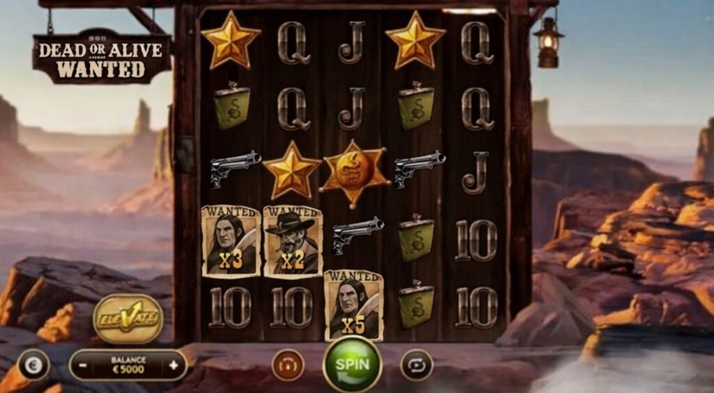 Dead or Alive Wanted slot game screenshot showing 5x5 reels with wanted posters, revolvers, sheriff stars, high balance of €5000, spin button and Elevate casino interface in Wild West desert landscape